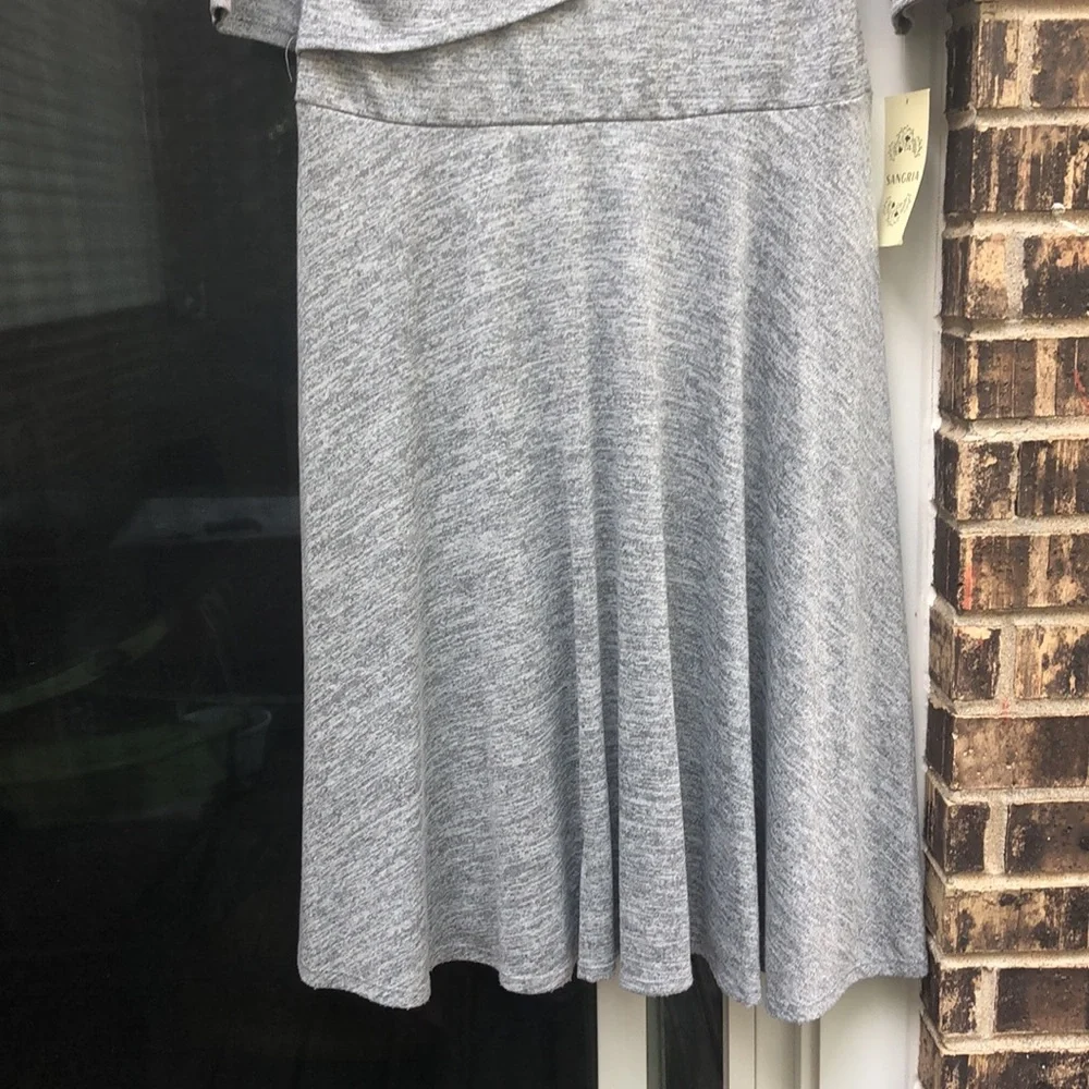 - NWT Sangria dress. Size 12. Long sleeved top with long skirt. Grey.